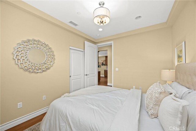 518 W Bencamp St, San Gabriel, CA 91776 - bedroom featuring wood finished floors, recessed lighting, a chandelier, and a closet
