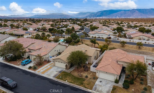 drone / aerial view featuring a mountain view