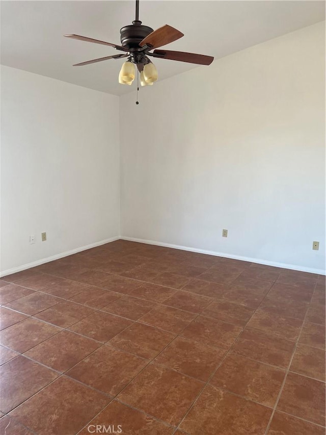 unfurnished room with ceiling fan