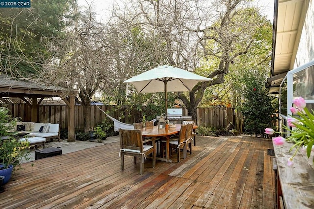 wooden deck with outdoor lounge area