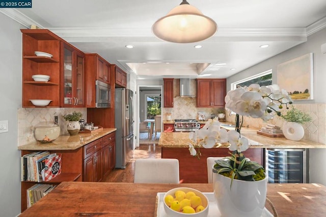 kitchen featuring wine cooler, wall chimney exhaust hood, light stone counters, ornamental molding, and stainless steel appliances