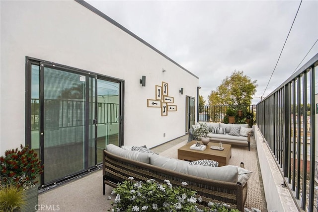 balcony featuring an outdoor living space