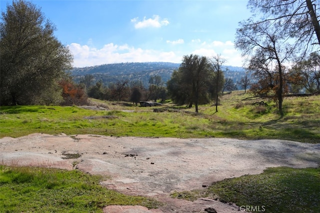 property view of mountains featuring a rural view