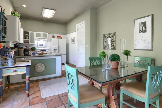 dining room with light tile patterned flooring