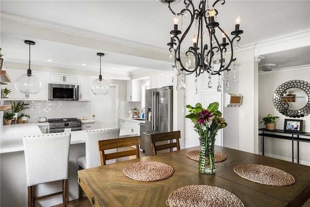 dining area with ornamental molding