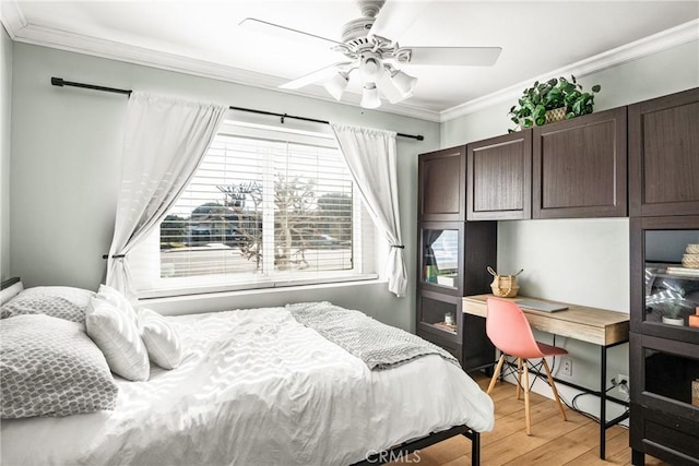 bedroom with ornamental molding, light hardwood / wood-style floors, and ceiling fan