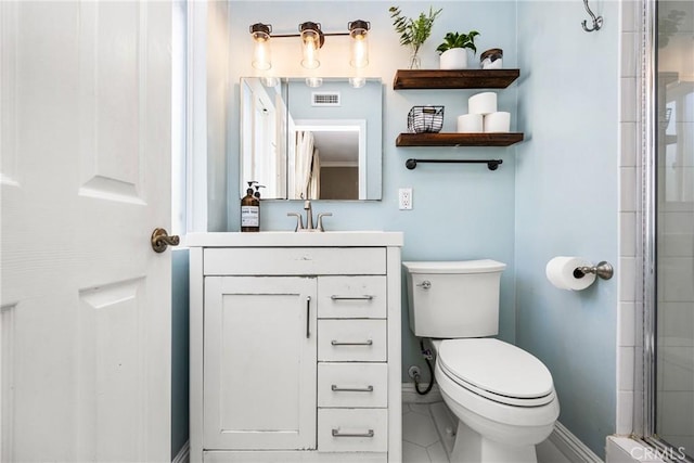 bathroom featuring vanity, walk in shower, and toilet