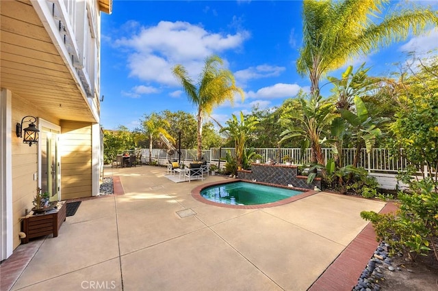 view of pool featuring a patio area