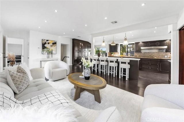 living room with hardwood / wood-style floors