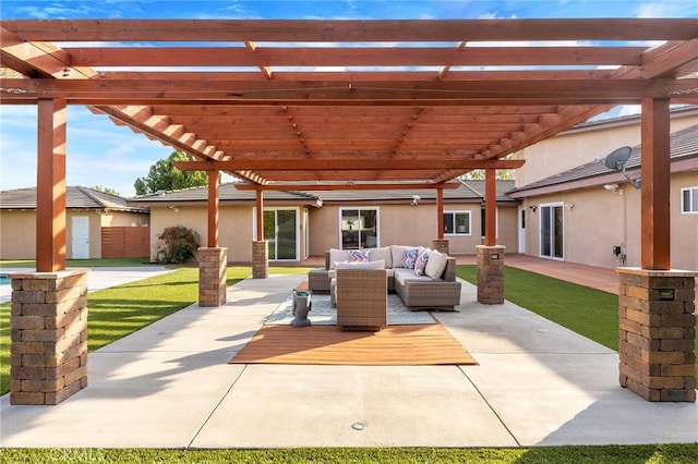 view of patio featuring an outdoor living space and a pergola