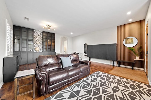 living room featuring dark hardwood / wood-style floors