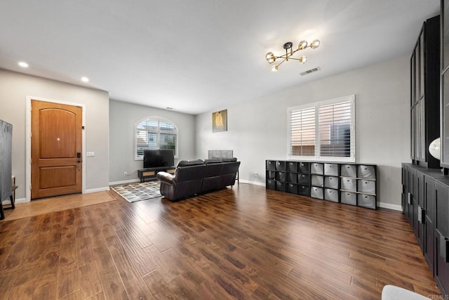 living room with mail boxes and dark hardwood / wood-style flooring