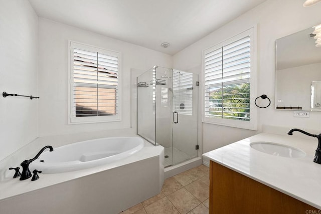 bathroom featuring vanity, tile patterned floors, and independent shower and bath