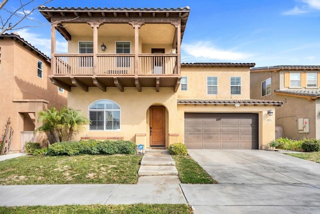 mediterranean / spanish-style home with a balcony and a garage