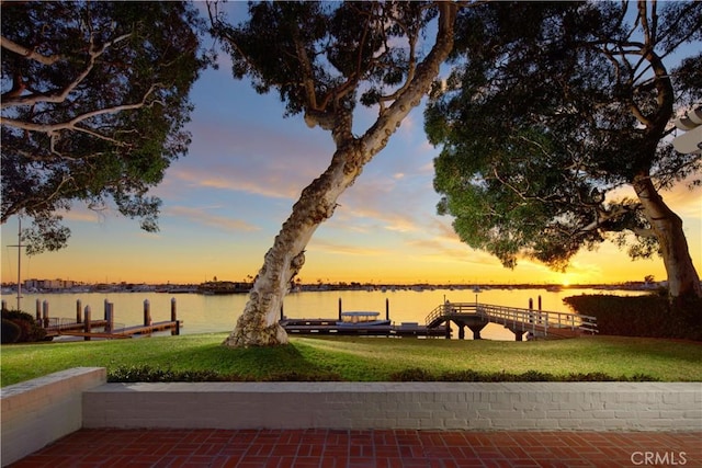 dock area featuring a water view