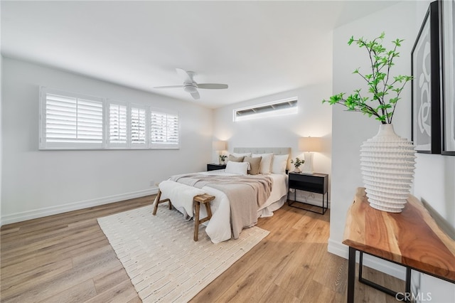 bedroom featuring ceiling fan and light hardwood / wood-style floors