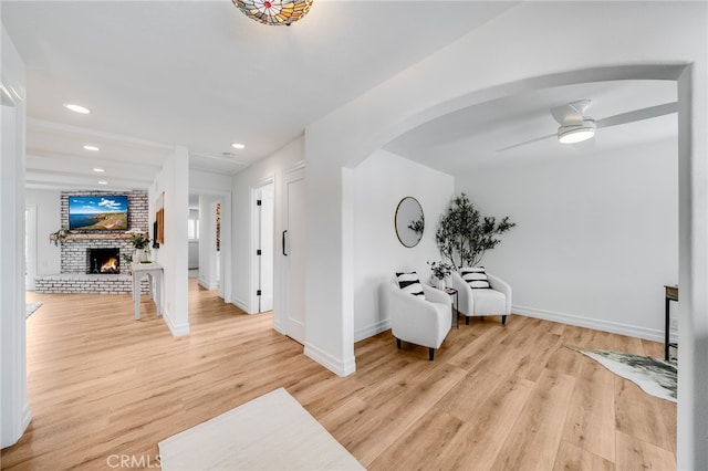 hall with light wood-type flooring