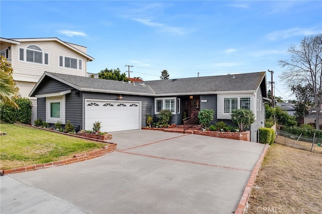 view of front facade featuring a garage and a front yard