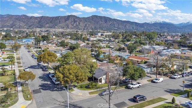 bird's eye view with a residential view and a mountain view