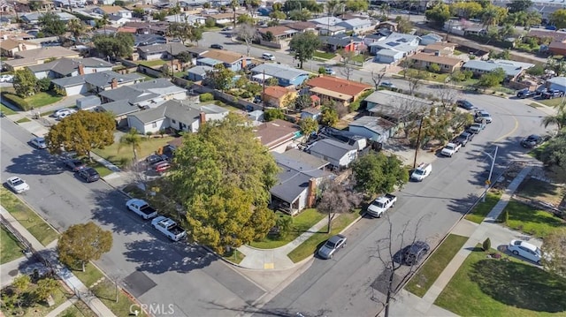 birds eye view of property with a residential view