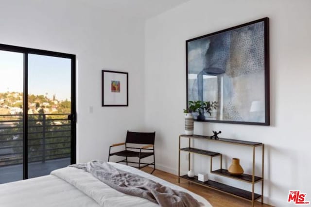 bedroom featuring wood-type flooring