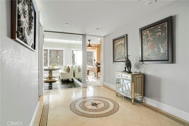 hallway featuring tile patterned floors