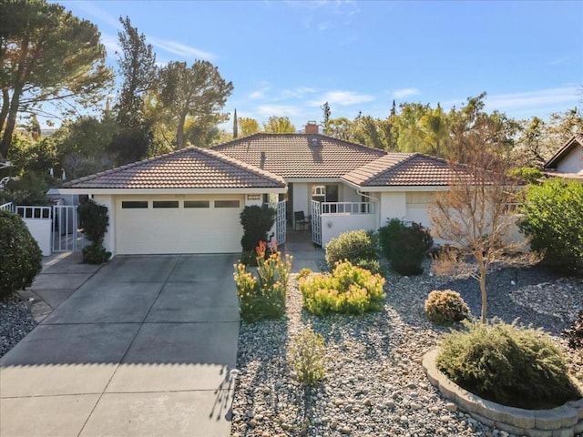 ranch-style house featuring a garage