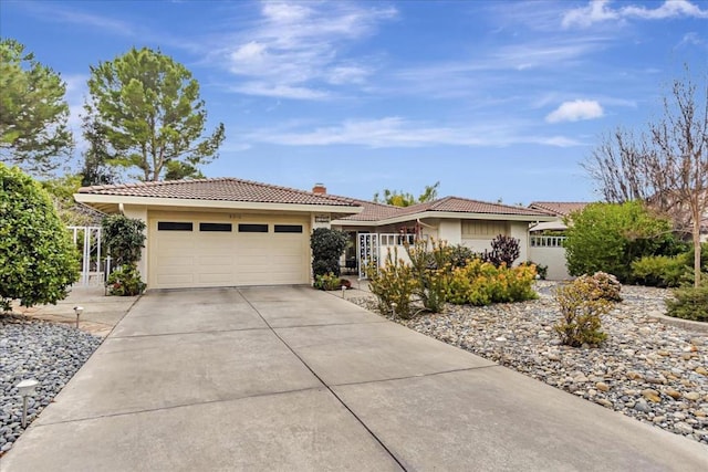 single story home featuring a garage