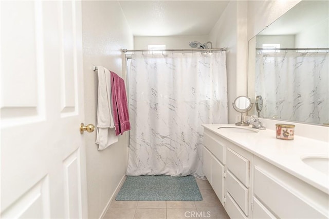 bathroom featuring vanity, tile patterned floors, and a shower with shower curtain