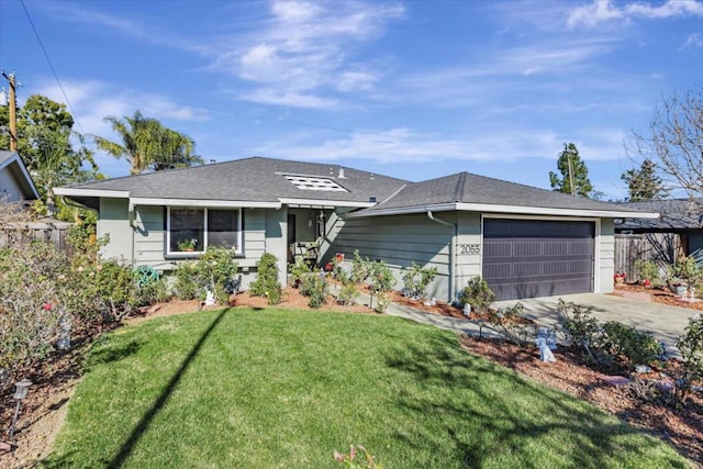 ranch-style house with a garage and a front yard