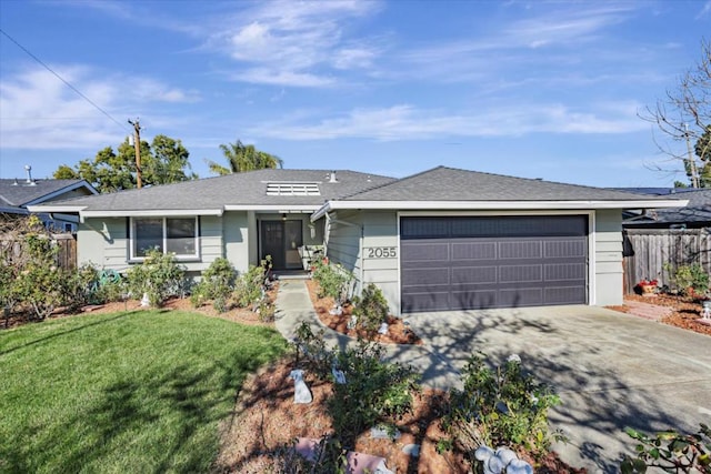 single story home with a garage and a front yard