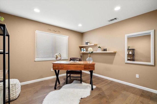 home office featuring hardwood / wood-style flooring