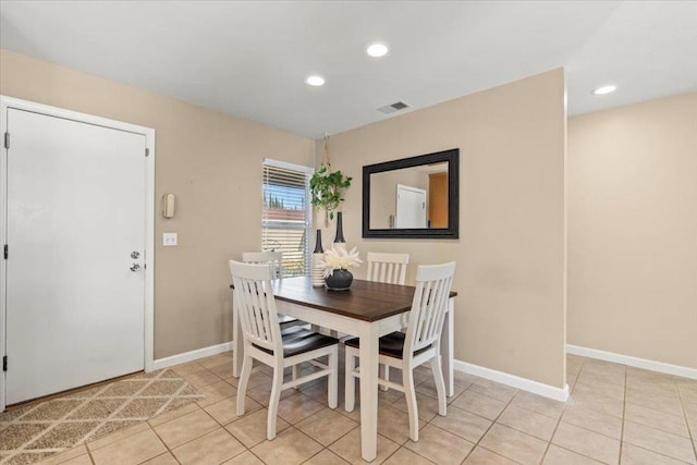 dining room featuring light tile patterned floors