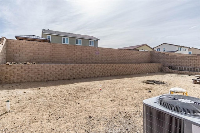 view of yard featuring central AC unit