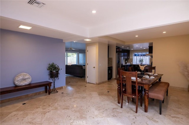 dining area featuring ceiling fan