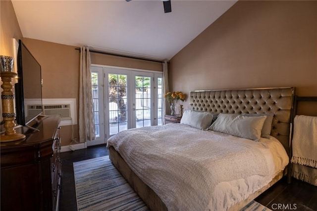 bedroom featuring french doors, lofted ceiling, dark hardwood / wood-style floors, ceiling fan, and access to exterior