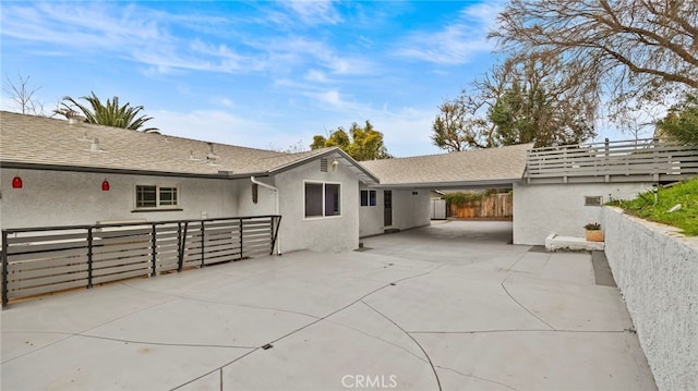 rear view of property with a patio