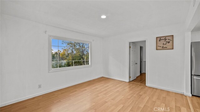 empty room featuring light wood-type flooring