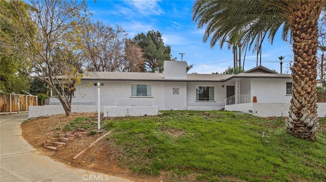 single story home with a front yard