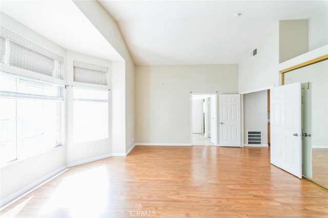 spare room with light hardwood / wood-style flooring