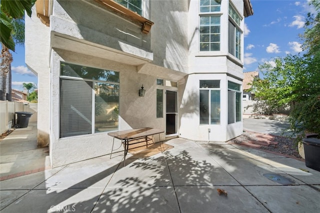 rear view of house featuring a patio area