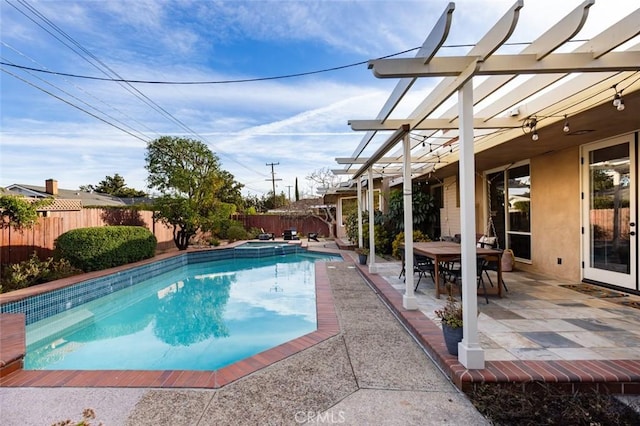 view of swimming pool featuring a pergola and a patio