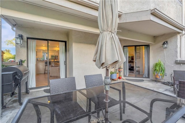 view of patio / terrace featuring grilling area and outdoor dining space