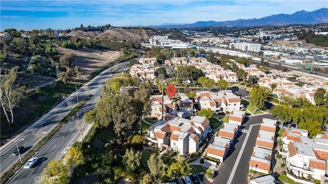 bird's eye view featuring a residential view and a mountain view