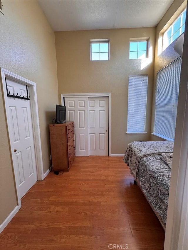 bedroom with light hardwood / wood-style flooring