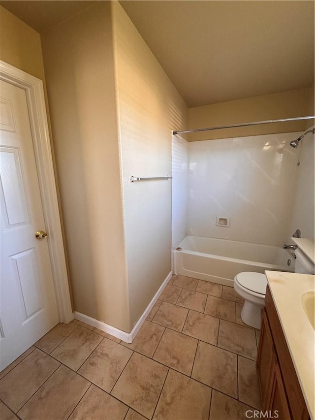 full bathroom featuring tile patterned flooring, vanity, washtub / shower combination, and toilet