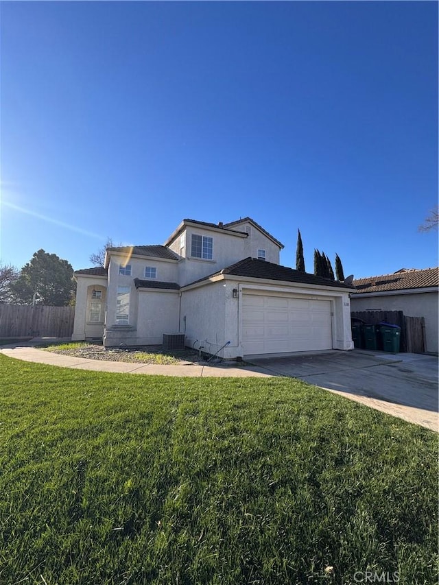 view of front facade featuring a garage and a front yard