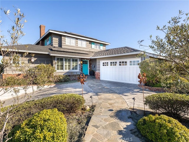 view of front property with a garage