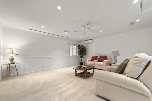 carpeted living room with a wall mounted air conditioner and ceiling fan