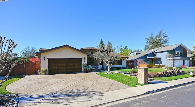 single story home featuring a garage